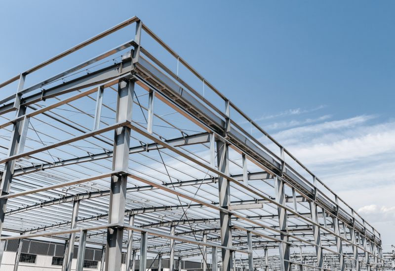 steel structure workshop against a blue sky